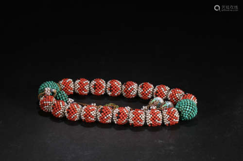 A RED CORAL BRACELET OF 18 BEADS