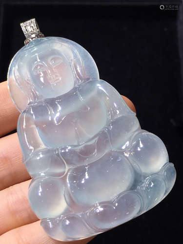 AN ICY BUDDHA SHAPED JADEITE PENDANT