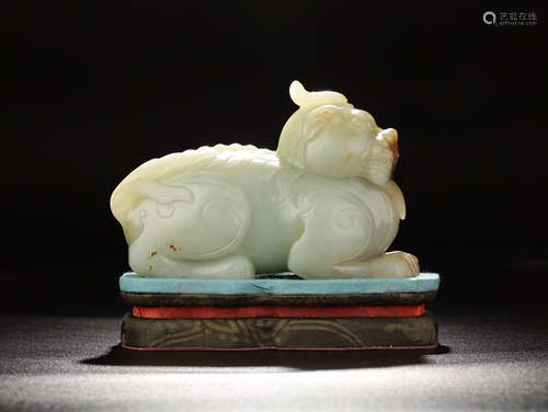 A HETIAN JADE ORNAMENT OF BEAST SHAPED