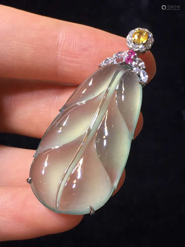 AN ICY LEAF SHAPED JADEITE PENDANT