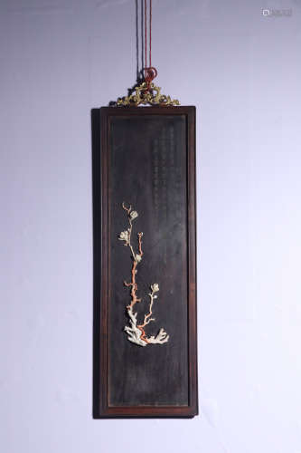 A ZITAN WOOD SCREEN WITH EMBEDDED CORAL AND WRITTEN POETRY