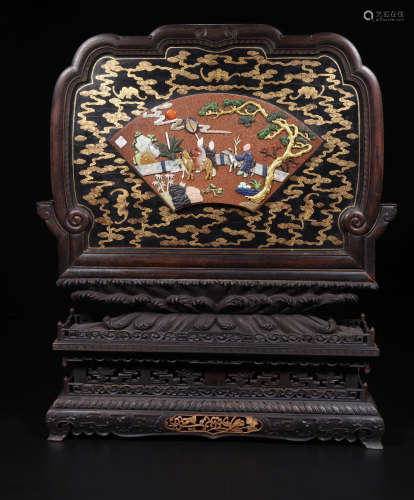 A STORY-TELLING ZITAN WOOD SCREEN WITH EMBEDDED TOURMALINE