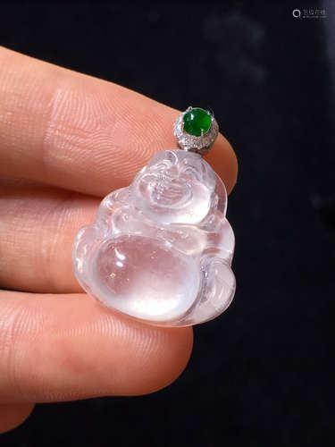 AN ICY JADEITE PENDANT CARVED IN BUDDHA