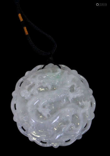 A JADEITE TABLET OF DRAGON CARVING