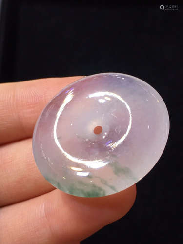 AN ICY CIRCLE JADEITE PENDANT