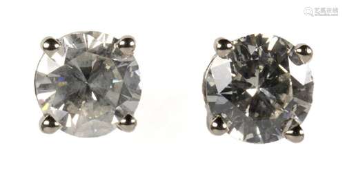 Pair of diamond and 14k white gold earrings