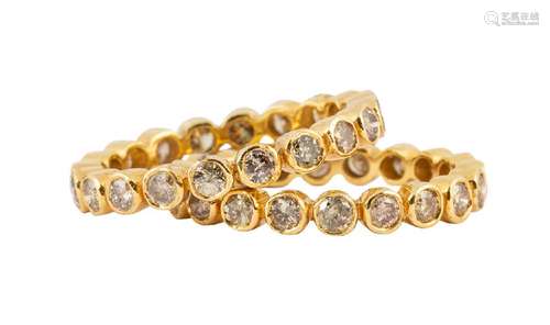 Diamond and 18k yellow gold eternity bands