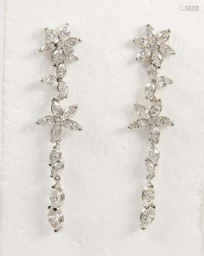 Pair of diamond and 18k white gold earrings