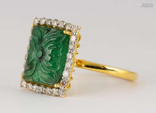 Carved emerald, diamond and 18k yellow gold ring