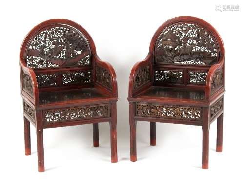 A pair of late 19th century Chinese carved red lacquer throne chairs (2).