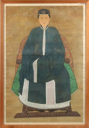 A 19th century Chinese painting on silk depicting an official's wife, in glazed frame, 57.1 by 39.