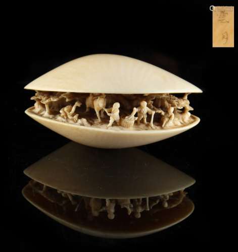 Property of a lady - a Japanese carved ivory okimono depicting the clam's dream, signed Ungetsu,