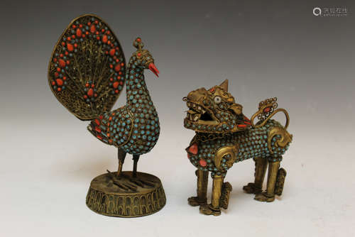 Two Chinese metal figurines with coral inlaid.