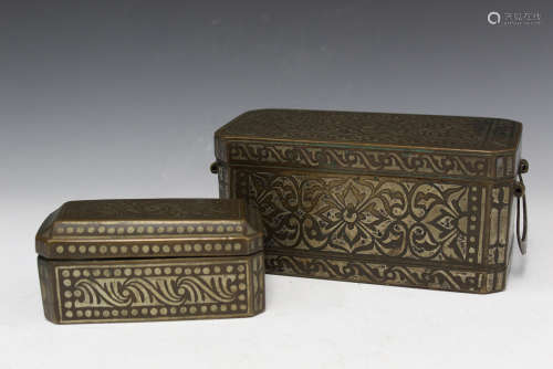 Two Islamic metal boxes.