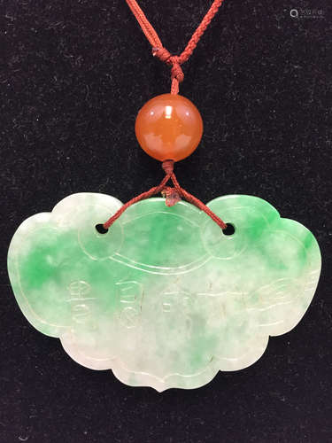 Chinese carved jadeite pendant with an agate bead.