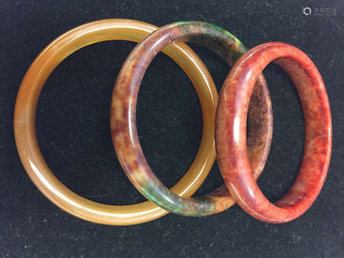 Three Chinese bangles.