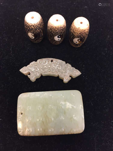 Two Chinese jade carving and three wood pieces.