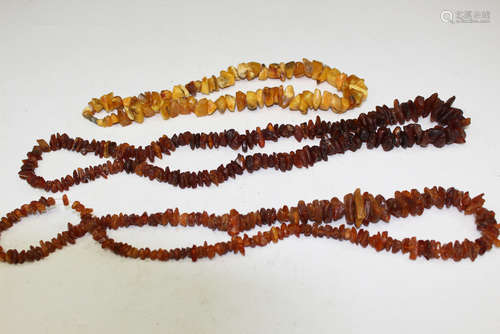 Three amber necklaces.