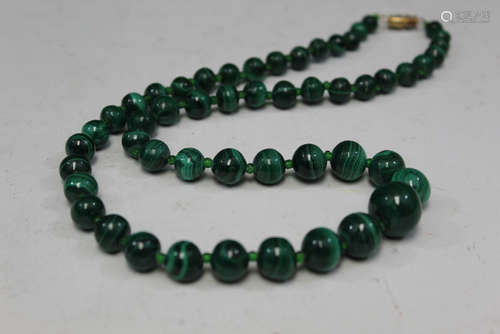 Malachite necklace.