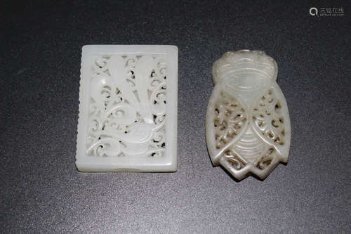 Two Chinese jade pendants.