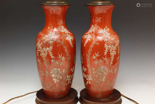 Pair of Chinese coral red porcelain lamps.