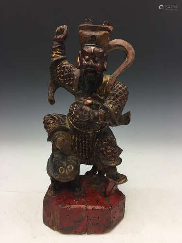 Chinese carved wood figure of Wusong fighting with