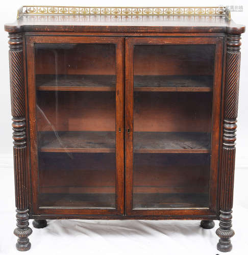 A Regency mahogany glazed dwarf cabinet bookcase