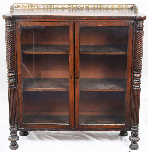 A Regency mahogany glazed dwarf cabinet bookcase