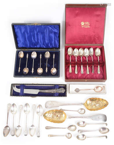 A collection of silver spoons