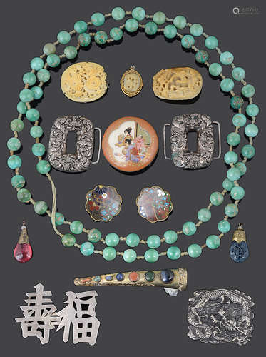 A small collection of Oriental jewellery including three carved Canton ivory brooches