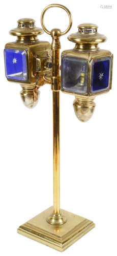 A late 19th century portable gilt brass coaching oil lamp