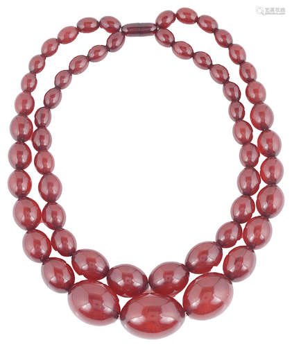 An Art Deco double row cherry amber bead necklace