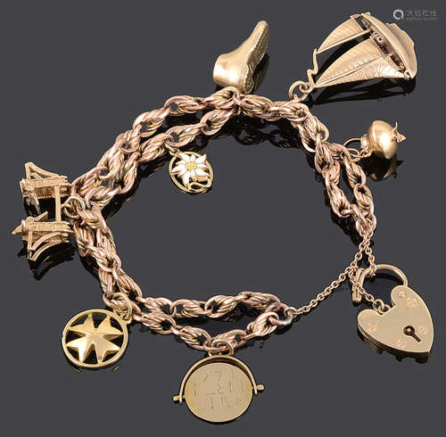 A 9ct gold fancy link charm bracelet