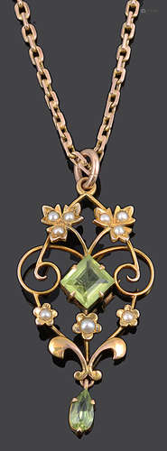 A delicate Edwardian peridot and seed pearl scroll pendant on chain