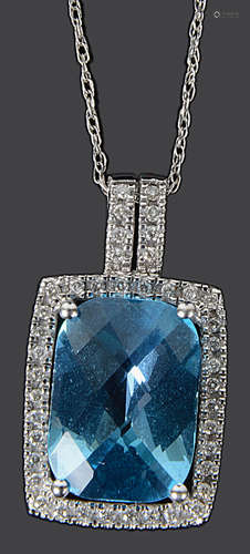 A Contemporary 14ct white gold blue gem and diamond pendant