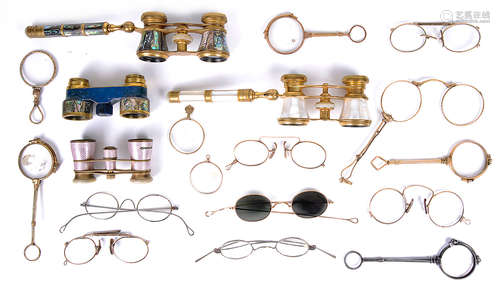 A collection of 19th century opera glasses, lorgnettes, and spectacles