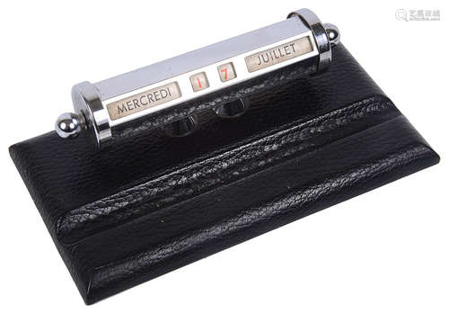 A mid century Fr. chrome perpetual desk calendar