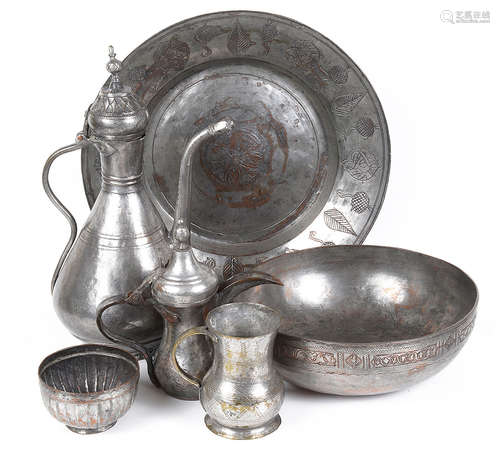 A collection of Islamic tinned copper metalware