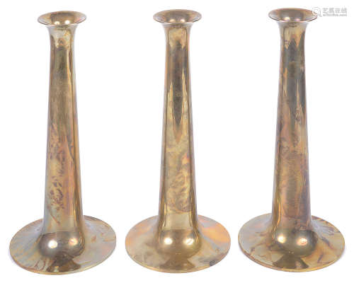 A set of three Danish Torben Oskov & Co brass candlesticks designed by Max Bruel