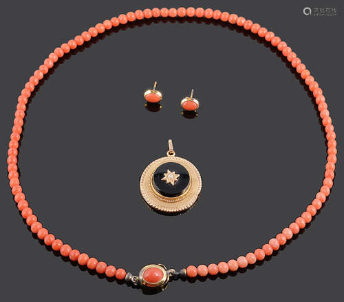 A delicate coral bead necklace and ear studs