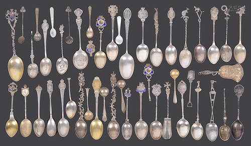 A collection of mostly early 20th century silver commemorative and other spoons