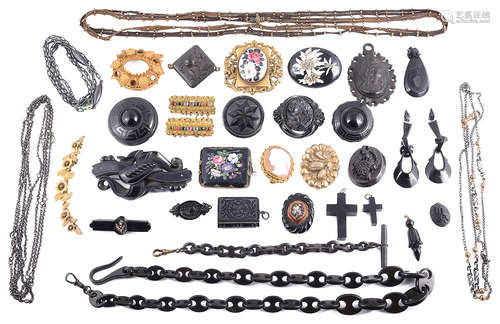 A collection of Victorian carved Whitby jet and other mourning jewellery