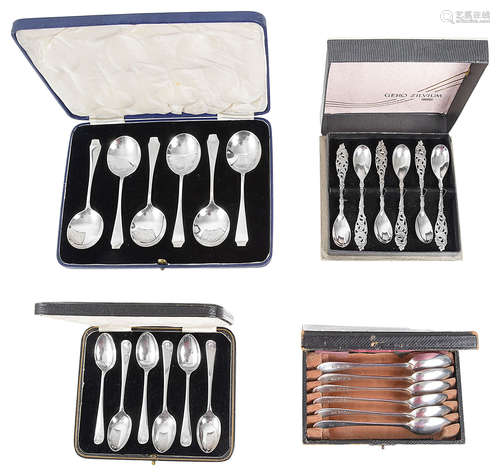 Three cased sets of silver spoons