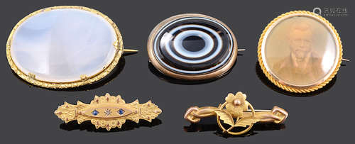 Five Victorian and later yellow metal brooches