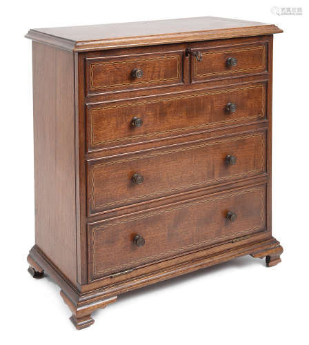 Edwardian mahogany tabletop stationary cabinet in the form a miniature George III chest of drawers
