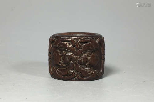 A Chinese Carved Agar-Wood Ring