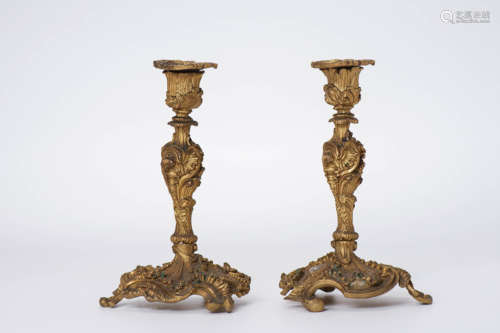 A Pair of Chinese Gilt Bronze Candle Holders