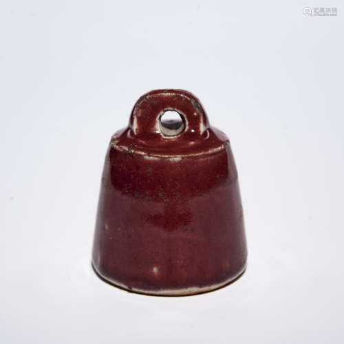 A Chinese Red Glazed Porcelain Scale Weight