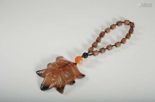 A Chinese Carved Agate Pendant