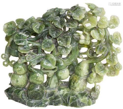 Weighty and outstanding jade sculpture, tree shaped, 19th century. Orient. With decorations on